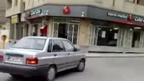  لحظه سرقت از بانک ملت مشهد توسط دو سارق مسلح
