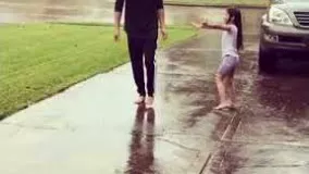 بنیامین بهادری و دخترش زیر باران - آمریکا
