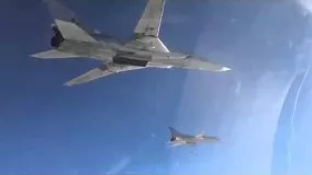 شکاری اف14 تامکت نیروی هوایی ایران در حال اسکورت بمب افکن‌های روسی
