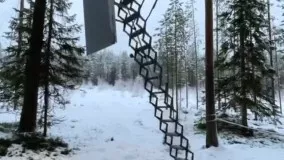 هتل درختی در دل جنگل برفی
