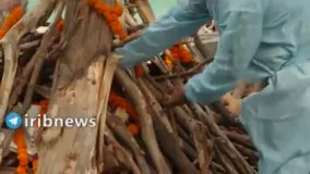 تصاویری وحشتناک از سوزاندن اجساد قربانیان کرونا در هند
