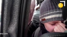 اشک ریختن کودک اوکراینی پس از جدایی از پدرش